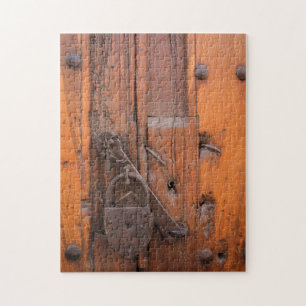 Padlock on wooden door jigsaw puzzle