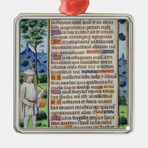 Page of text with a border detail of a metal tree decoration