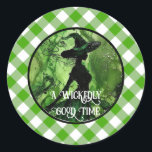 Painted Wickedly Good Witch Green Gingham Plaid Classic Round Sticker<br><div class="desc">Painted Wickedly Good Witch Green Gingham Plaid Stickers - These stickers feature a green and black painting of a witch in an enchanted forest on top of a white and green gingham chequered plaid pattern. Perfect for any age girl or woman's birthday or for a Halloween Party. Designed for those...</div>