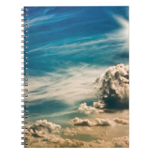 Paintery sky. Beautiful dramatic sky with clouds a Notebook