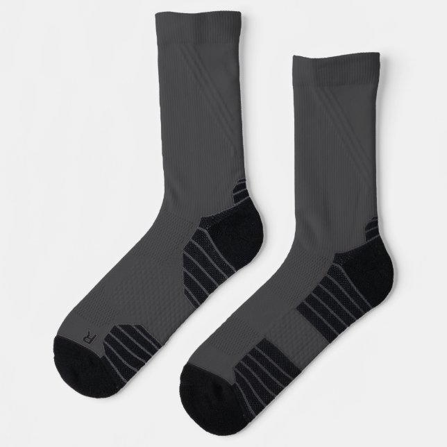 pair of dark grey/black crew-length socks (Left)