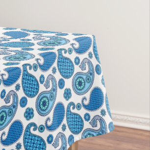 Paisley pattern, shades of blue on white tablecloth