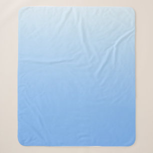 Pale blue ombre background sherpa blanket