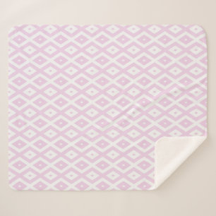 Pale pink and white diamond pattern sherpa blanket