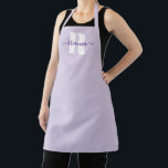 Pale Purple Script Name Bold Monogram Apron<br><div class="desc">Classic minimalist monogrammed apron for your kitchen decor.
Customise the bold font style as needed.
If you change the royal purple colour of the elegant signature script with swashes,  make sure to double check the drop shadow is the colour you want.
You can customise the pale purple background colour.</div>