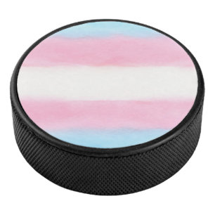 pale trans flag design on hockey puck