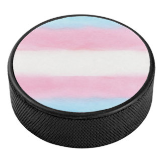 pale trans flag design on hockey puck