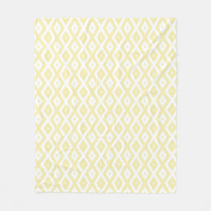 Pale yellow and white diamond pattern fleece blanket