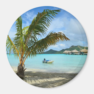 Palm tree and overwater resort round magnet