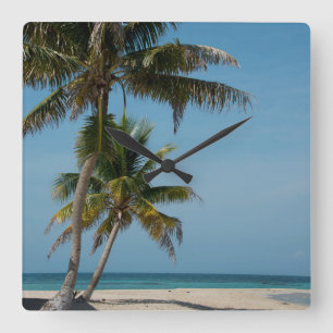 Palm tree and white sand beach square wall clock