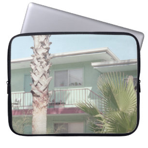 PALM TREE NEAR WHITE CONCRETE HOUSE LAPTOP SLEEVE