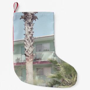 PALM TREE NEAR WHITE CONCRETE HOUSE SMALL CHRISTMAS STOCKING