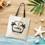 Palm Trees Heart Destination Wedding Beach Welcome Tote Bag<br><div class="desc">Welcome bags for beach wedding guests personalised with  couple names, wedding date and location. Palm trees illustration frames the details of the destination wedding .</div>
