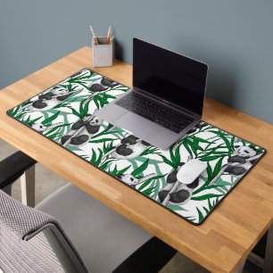 Panda cubs on desk mat