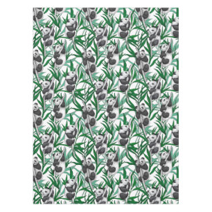 Panda cubs on tablecloth