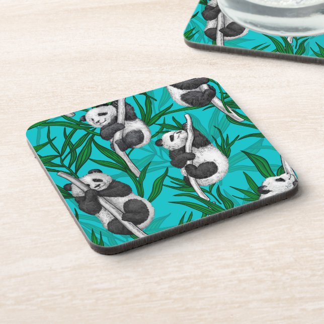 Panda cubs on turquoise coaster (Left Side)