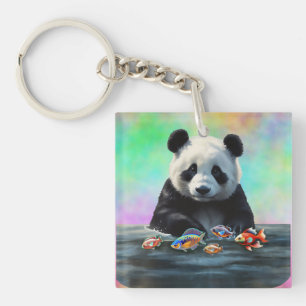 Panda gazes at Colorful Group of Swimming Fish Key Ring