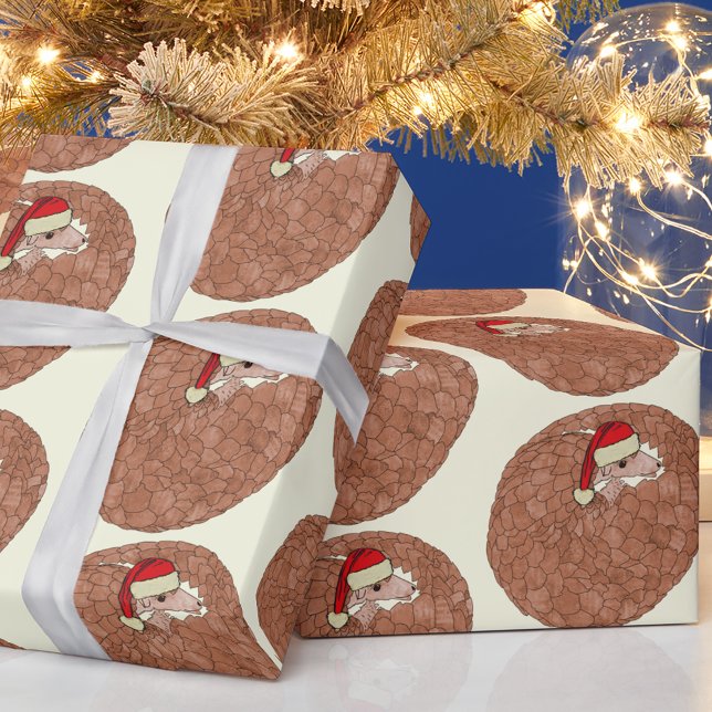 Pangolin Endangered Animal Christmas  Wrapping Paper (Christmas cute pangolin holiday wrapping paper Rolled up pangolin wearing a Santa hat pattern)