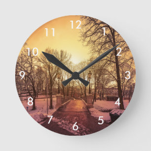 Panoramic view of snowy park during sunset in Riga Round Clock