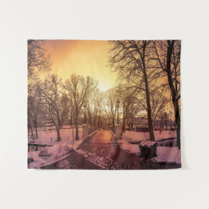 Panoramic view of snowy park during sunset in Riga Tapestry