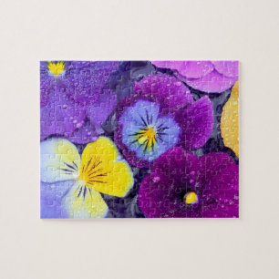 Pansy flowers floating in bird bath with dew jigsaw puzzle