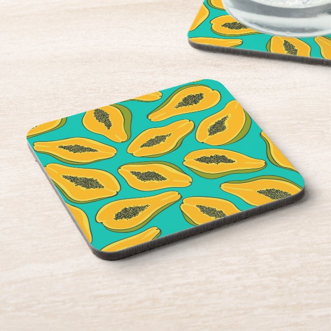 Papaya slices on turquoise coaster (Left Side)