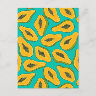 Papaya slices on turquoise postcard