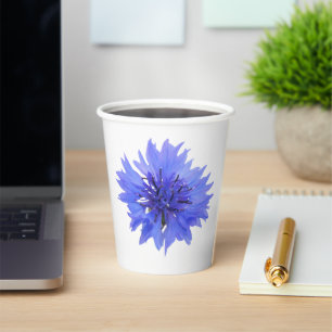 Paper cup with blue cornflower