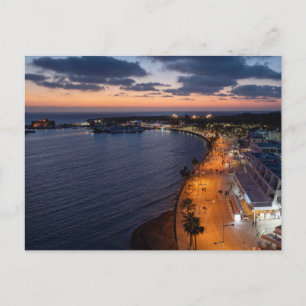 Paphos seafront and harbour at night postcard