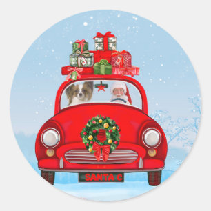 Papillon Dog In Car With Santa Claus  Classic Round Sticker