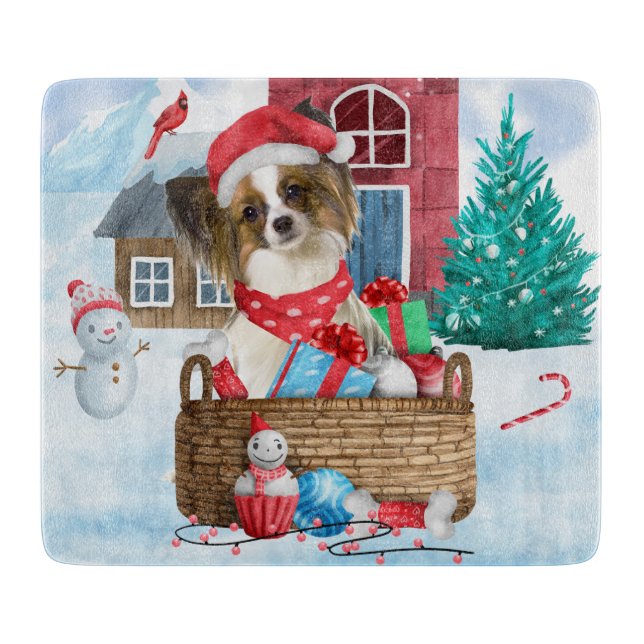 Papillon Dog In snow Christmas Dog House Cutting Board (Front)