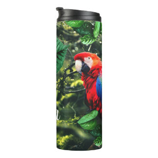 Parrot scarlet macaw in jungle with flowers thermal tumbler