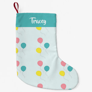 Party balloons on blue small christmas stocking