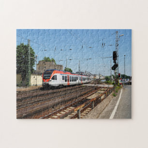 Passenger train in coarse home on the Rhine Jigsaw Puzzle