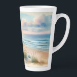 Pastel Coastal Dunes Watercolor Latte Mug<br><div class="desc">Soft coastal serenity unfolds through a dreamy watercolor scene of rolling sand dunes, sea oats, scattered shells, and a calm horizon where gentle waves meet a pastel sky. Airy brushstrokes and blended hues of blush, sky blue, seafoam, and warm sand create a tranquil, cottagecore coastal mood that feels both nostalgic...</div>