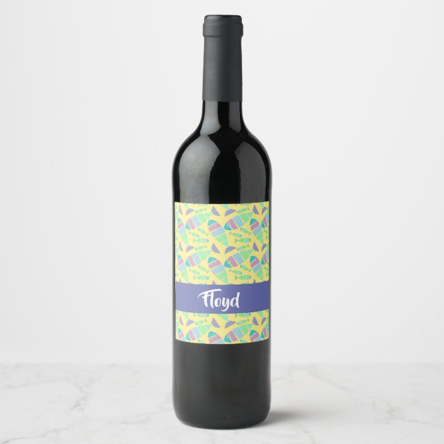 Pastel colourful fishes on yellow wine label (Front)