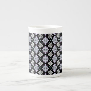 Pastel floral shapes on a black background bone china mug
