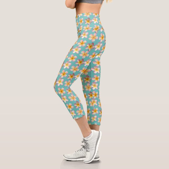 Pastel Frangipani Plumeria Flowers on Teal Capri Leggings (Left)