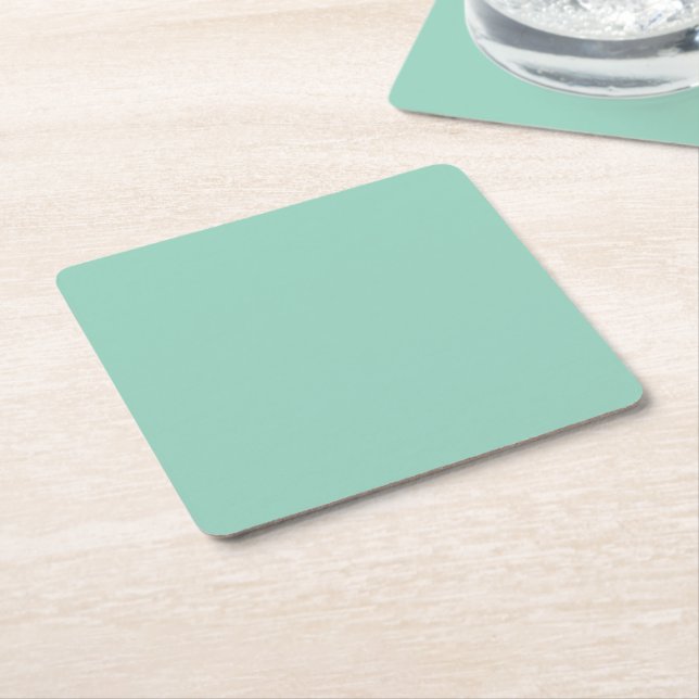 Pastel green solid colour square paper coaster (Angled)