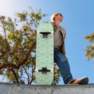 Pastel green with white fencing pattern on skateboard