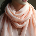 Pastel peach - solid colour  scarf<br><div class="desc">Wrap yourself in softness and elegance with this flowing Pastel Peach chiffon scarf. Measuring 16 inches wide by 72 inches long, this oblong rectangle scarf offers endless styling possibilities—whether draped over your shoulders, tied around your neck, or worn as a headscarf. Crafted from lightweight chiffon, this scarf is both airy...</div>