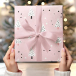 Pastel Pink Background with White Christmas Tree  Wrapping Paper<br><div class="desc">Wrap your holiday gifts in style with this elegant Pastel Pink Background with White Christmas Tree wrapping paper. The soft pink backdrop creates a modern and festive look, while the delicate white Christmas tree pattern adds a touch of seasonal charm. Perfect for those who love understated yet stylish holiday decor,...</div>