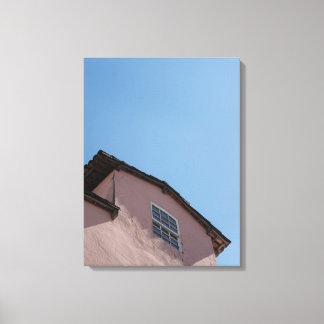 Pastel Pink Colonial Architecture Under a Clear Bl Canvas Print