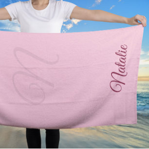 Pastel pink solid colour monogrammed beach towel