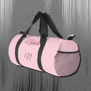 Pastel pink solid colour monogrammed duffle bag