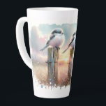 Pastel Watercolor Birds Fencepost Sunset Latte Mug<br><div class="desc">Soft watercolor brushwork captures two fluffy songbirds resting on weathered fence posts as a glowing sunset spreads across a dreamy countryside sky. Gentle washes of peach, blush pink, pale blue, and warm gold blend into a tranquil horizon, creating a calm pastoral atmosphere. The birds appear round and feathery, their delicate...</div>