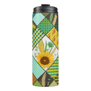 Patchwork cereals, sunflowers, geometric pattern. thermal tumbler