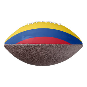 Patriotic american football with flag of Colombia