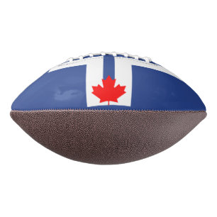 Patriotic american football with flag of Toronto