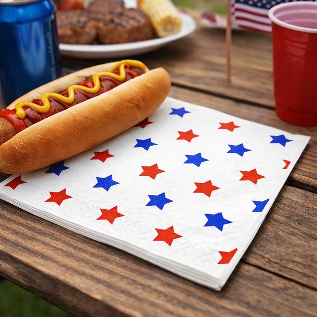 Patriotic Red and Blue Star Pattern Napkin (A paper napkin with a red and blues star pattern on a white background.)